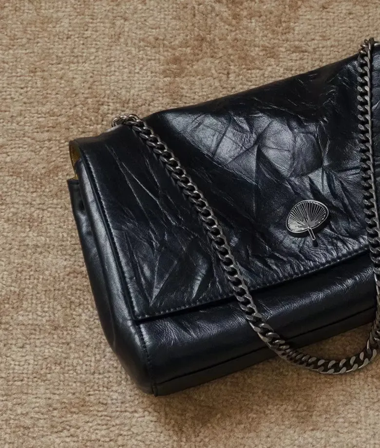 RIME cowhide reversible crossbody bag